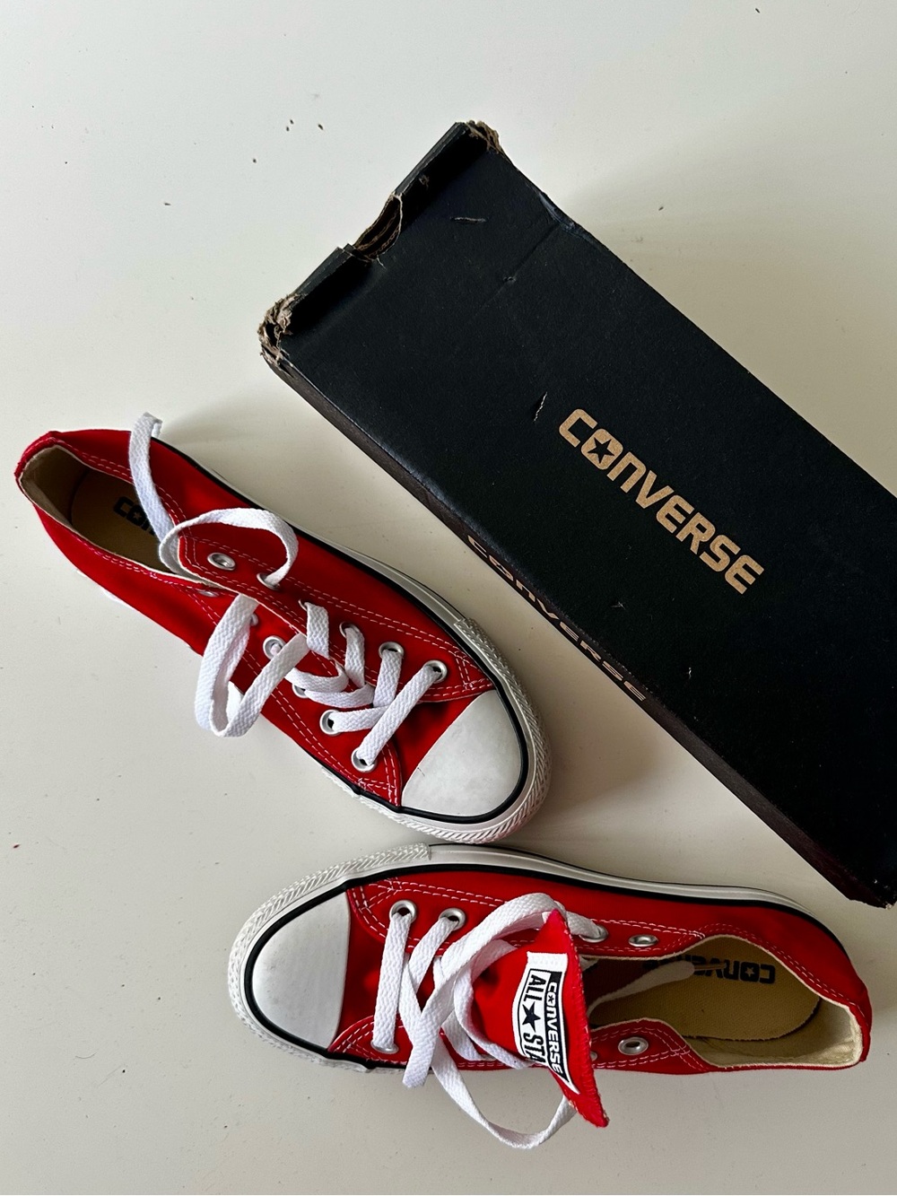 NIB red canvas Converse Chuck Taylor All Star low-top sneakers. Size 6.5